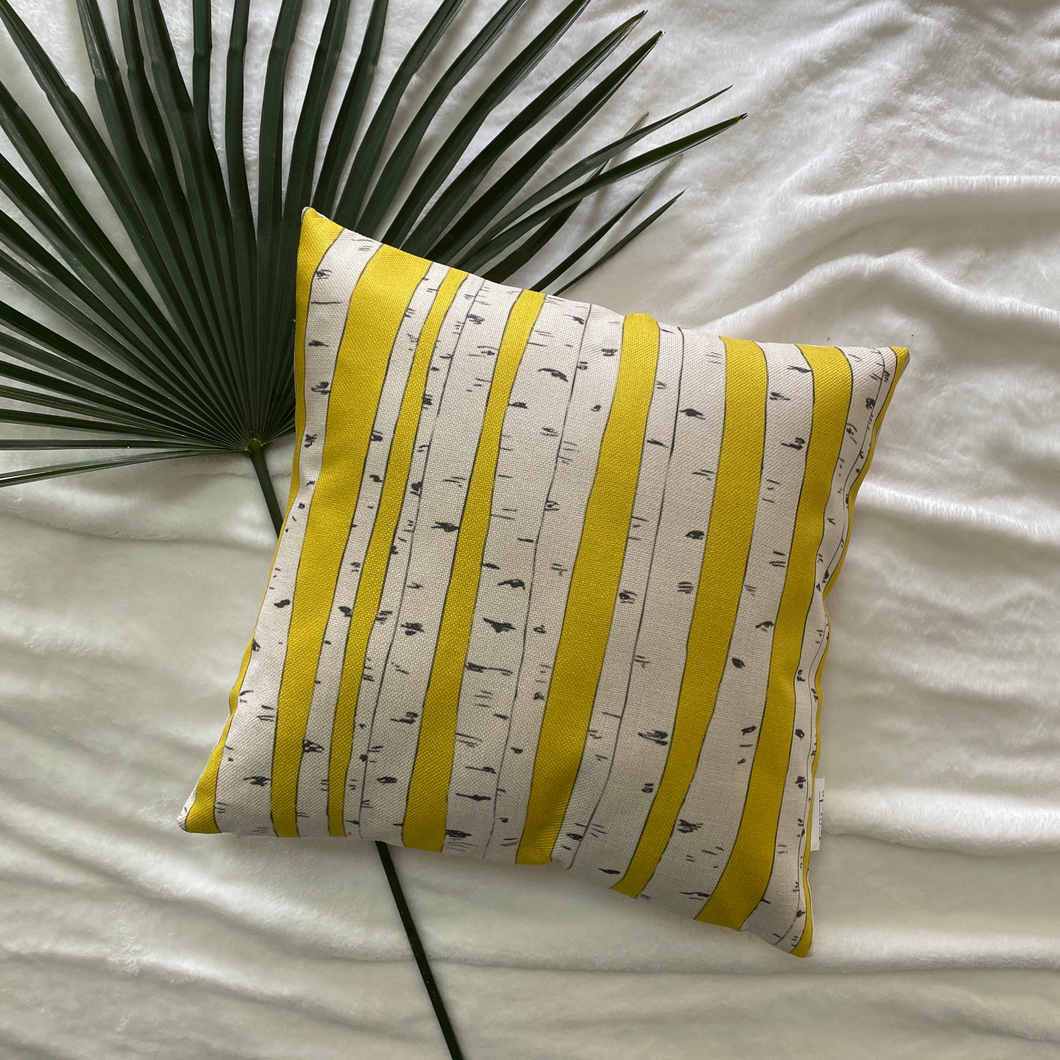 Our Sunshine Collection of Water-Resistant Outdoor Throw Pillowcase with bold 3D printed Birch tree trunks on a beautiful bright yellow background. Simply Breathtaking!