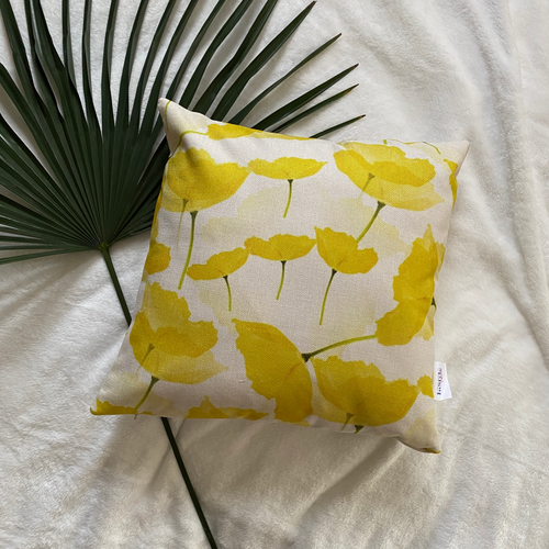 Our Sunshine Collection of Water-Resistant Outdoor Throw Pillowcase with wildflowers in hues of yellow on an off-white background. Simply Breathtaking!